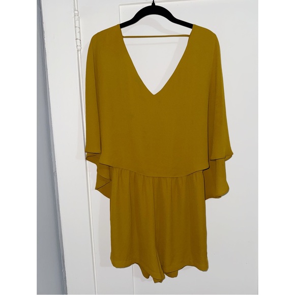BCBGMaxAzria Pants - BCBG Max Azria Carie Romper Cape Sleeve Mustard Yellow Gold V-Neck Flutter M